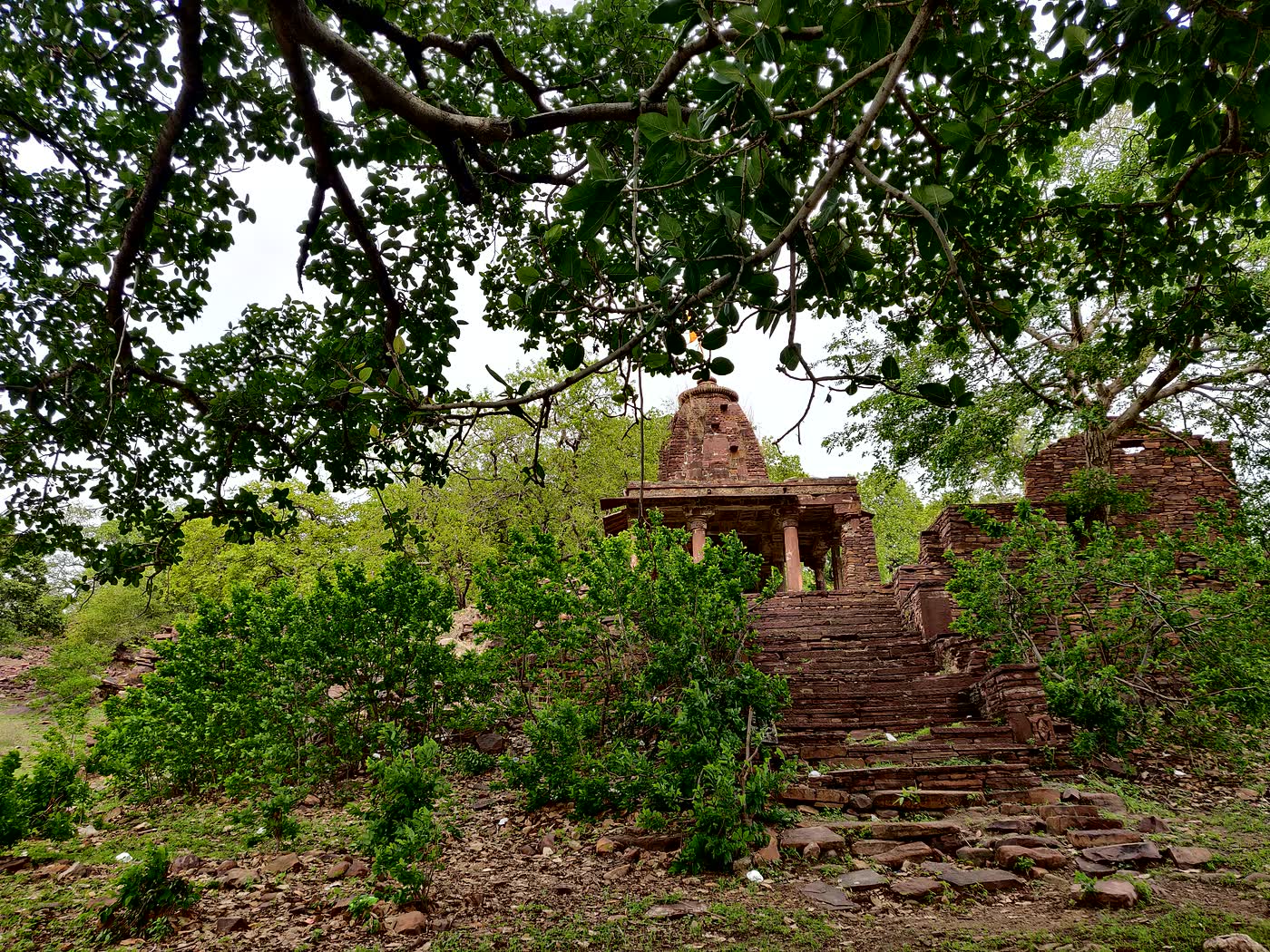 Ancient temple structure within green Mukundara landscape context